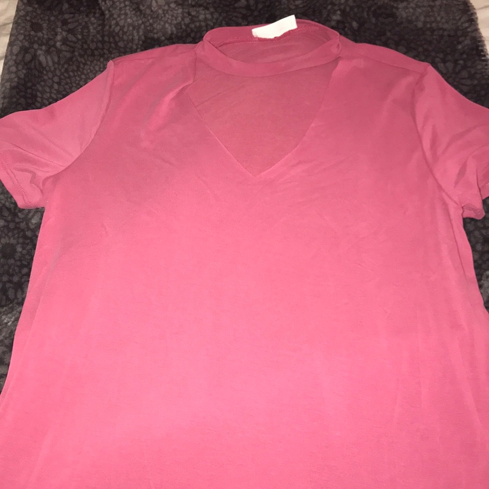 Pink blouse with neck cutout